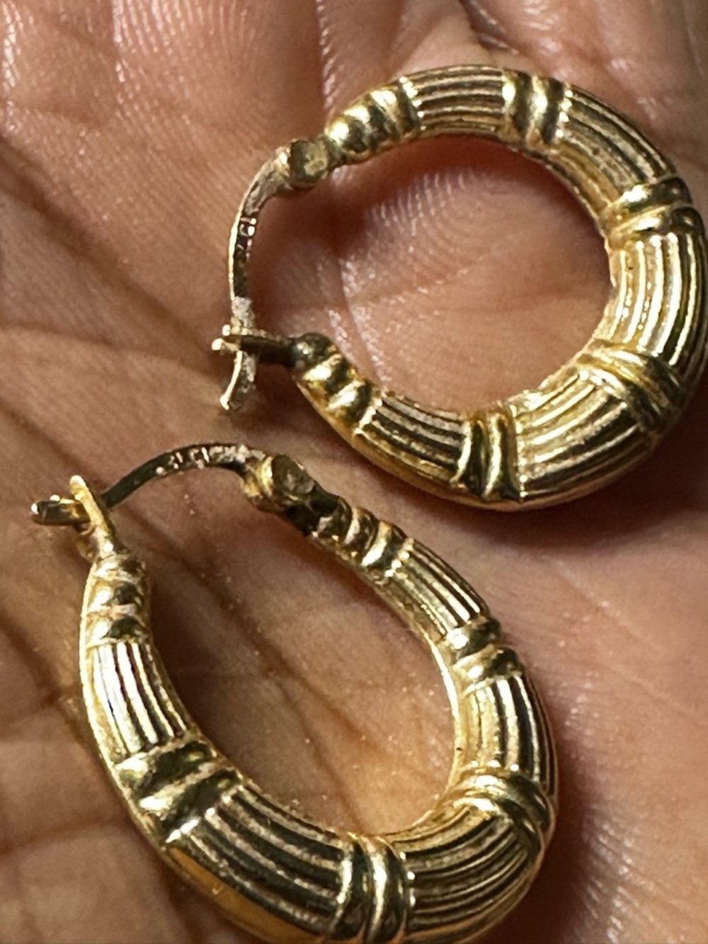 Vintage 10K/14K yellow gold hoop earrings featuring a bamboo-textured design